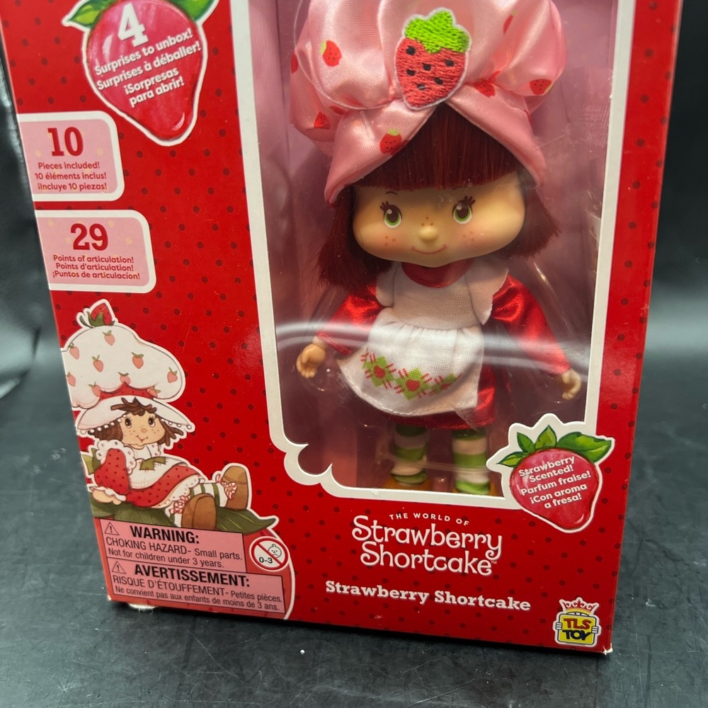 Doll with Red Dress and Pink Bow